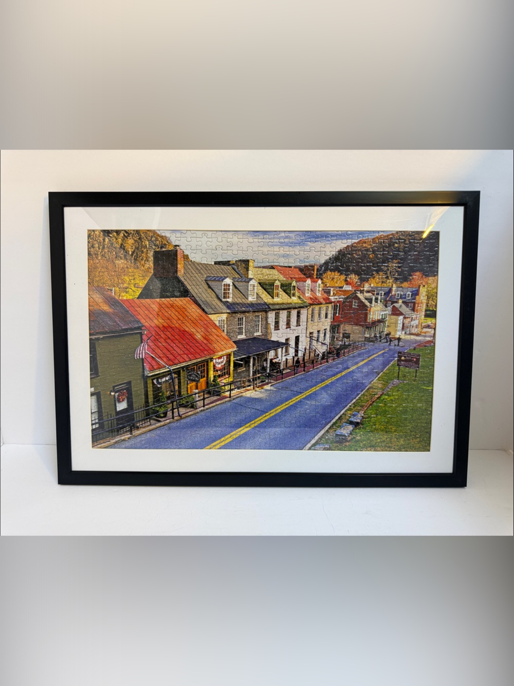 Framed Puzzle Village Street Art Print - Red Roof Accent